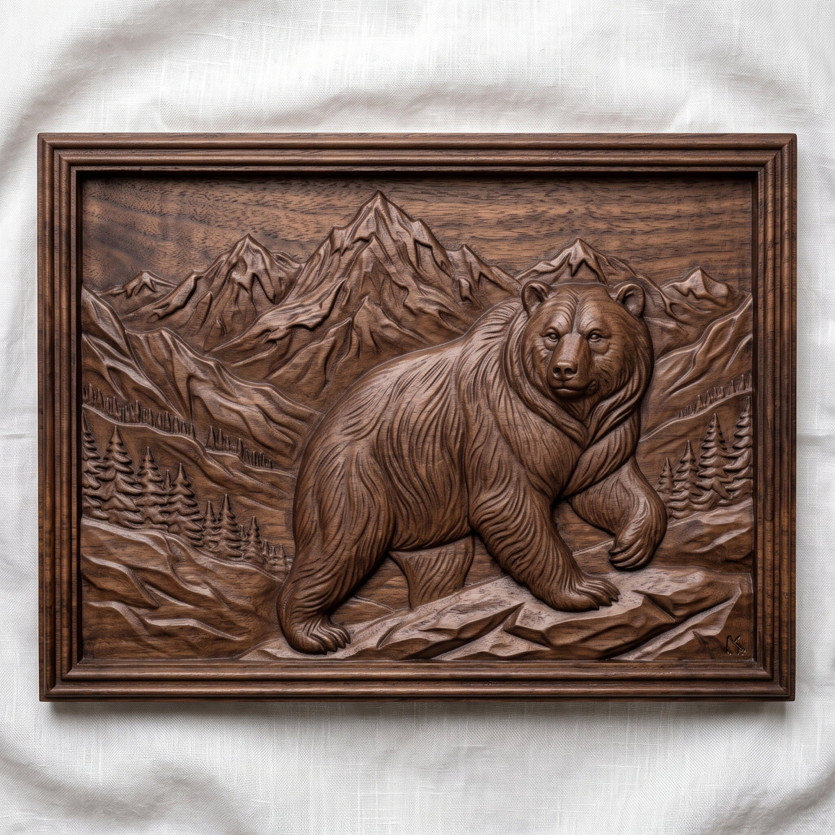 Detailed 3D bas-relief of a grizzly bear walking across rocky ground in front of snow-capped mountain peaks, with pine forest and alpine valleys behind. Framed by a rectangular stepped molded border around a recessed panel. Shown in carved walnut wood and grey resin. Designed for CNC relief carving, woodworking and 3D printing as rustic cabin and wildlife wall decor.
