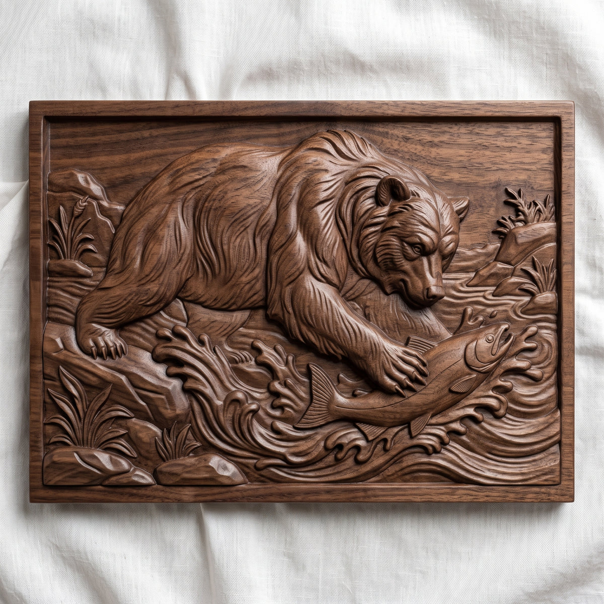 Detailed 3D bas-relief of a grizzly bear catching a leaping salmon in a rushing river, with splashing waves, riverside rocks and wild grasses. Framed by a rectangular border with a recessed panel and stepped inner edge. Shown in carved walnut wood and grey resin. Designed for CNC relief carving, woodworking and 3D printing as rustic cabin wildlife wall decor.