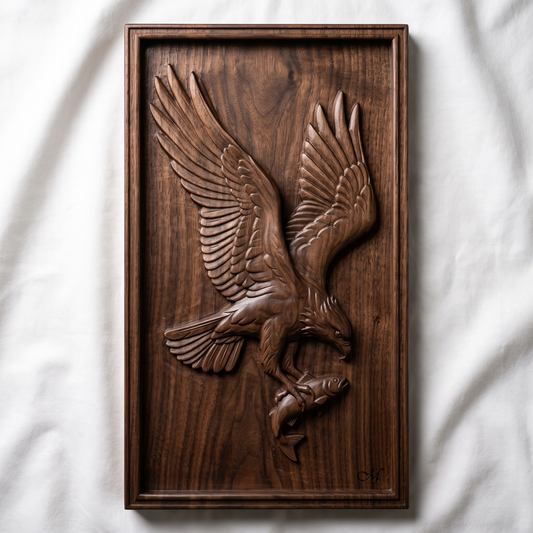 Highly detailed 3D bas-relief of a bald eagle diving with wings raised and spread wide, talons gripping a fish, head turned down toward its catch, carved in rich walnut wood. Framed by a raised, molded picture-frame border on a vertical rectangular panel. Fine relief carving captures individual feather barbs, fish scales, and natural wood grain. Designed for CNC relief carving, wood routing, and 3D printing as wildlife, lodge, or patriotic wall decor.