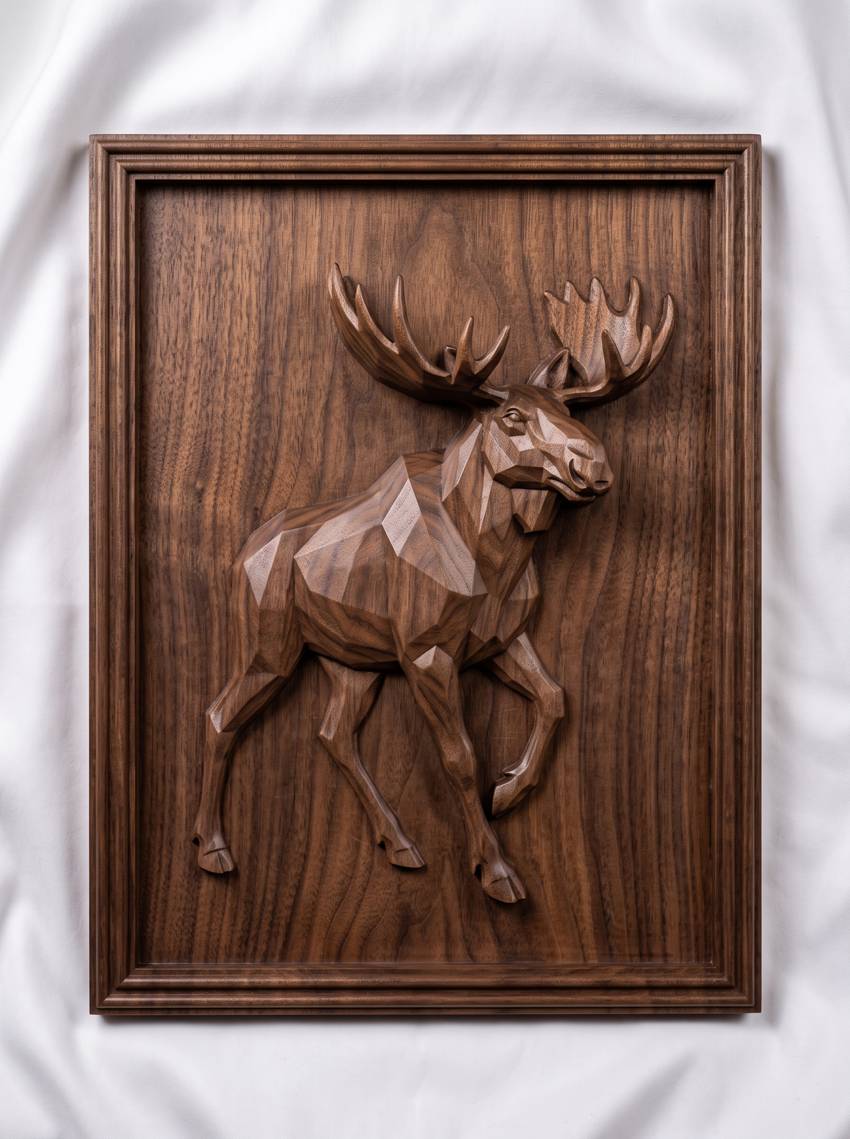 Faceted low poly moose with huge palmate antlers walking on a plain smooth background, shown as a portrait rectangular frame relief plaque with a stepped molded border, digital STL model for CNC router carving and 3D printing.