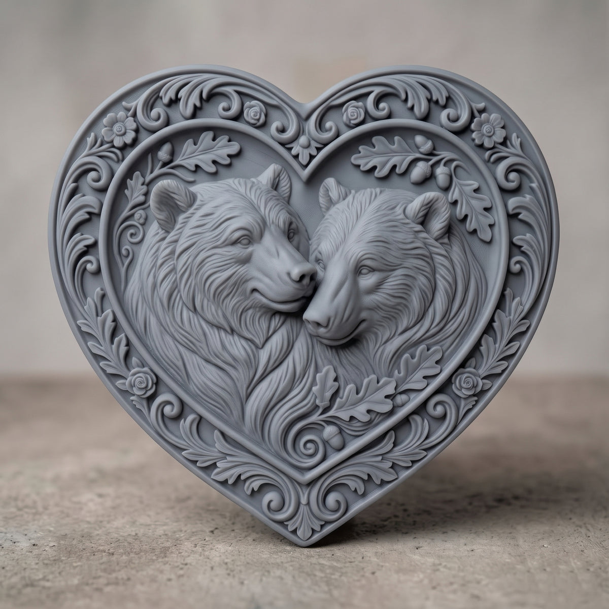 Detailed 3D bas-relief of two bears nuzzling cheek to cheek with thick flowing fur, framed in a heart-shaped panel with an ornate floral scroll border, oak leaves and acorns. Shown in carved walnut wood and grey resin. Designed for CNC relief carving, woodworking and 3D printing as romantic wall decor.