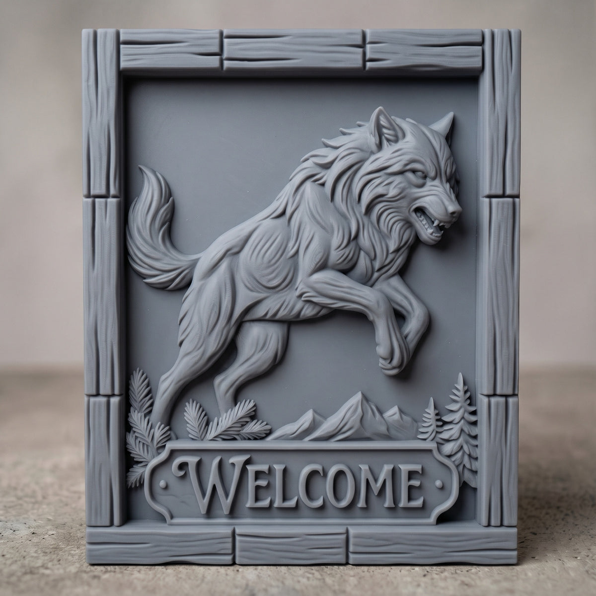 Detailed 3D bas-relief of a snarling gray wolf leaping with front paws raised, fur texture carved in deep relief, with pine branches, mountain peaks and fir trees at the base. A raised WELCOME name plaque sits at the bottom inside a rustic plank wood frame with wood grain. Designed for CNC router carving, wood routing and 3D printing as a welcome sign or cabin wall decor.