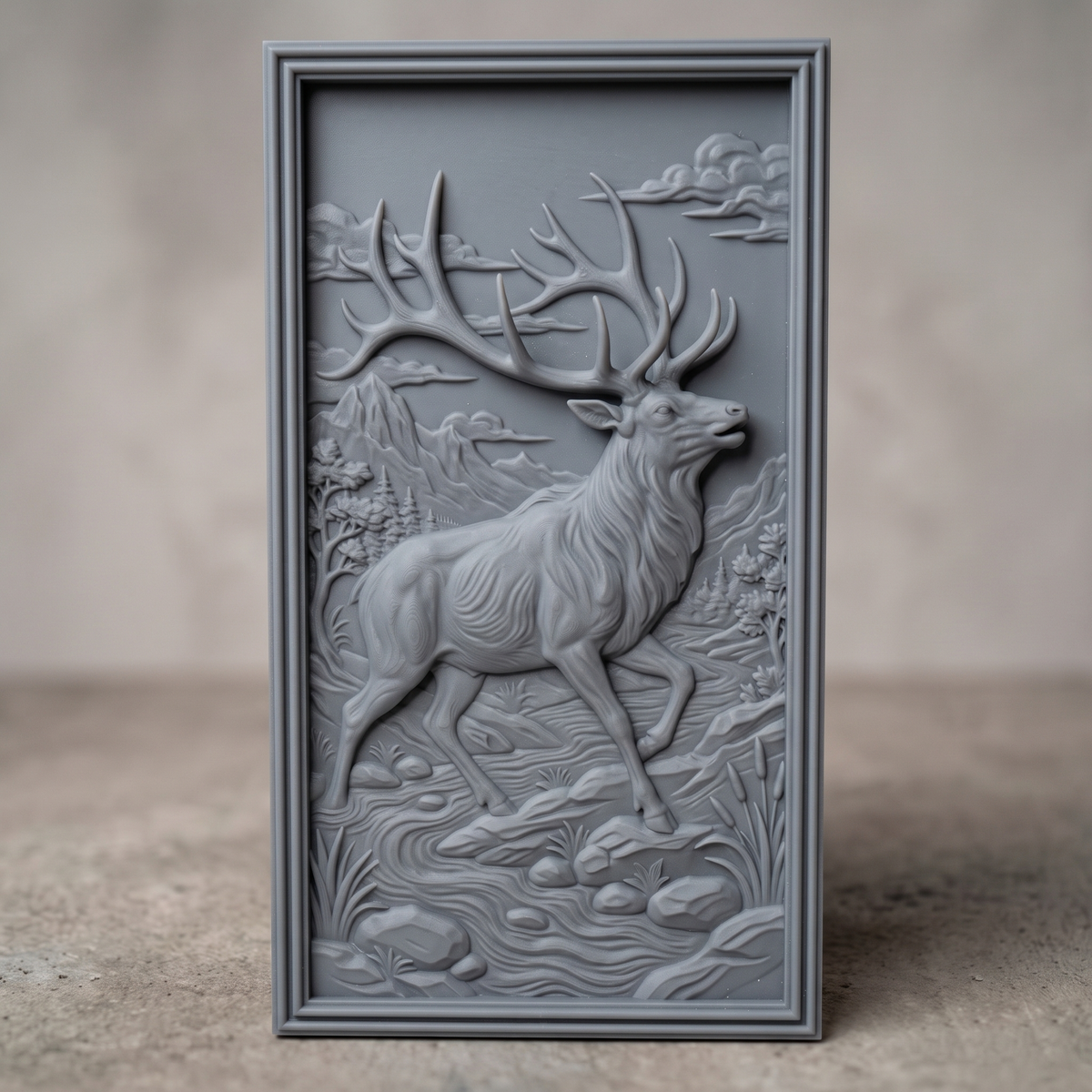 Detailed 3D bas-relief of a majestic bull elk with large antlers raised, striding through a mountain river valley with pine trees, cattails, rocks and clouds, set inside a stepped molded rectangular frame. Shown in carved walnut wood and grey resin. Designed for CNC relief carving, woodworking and 3D printing as rustic wildlife wall decor.