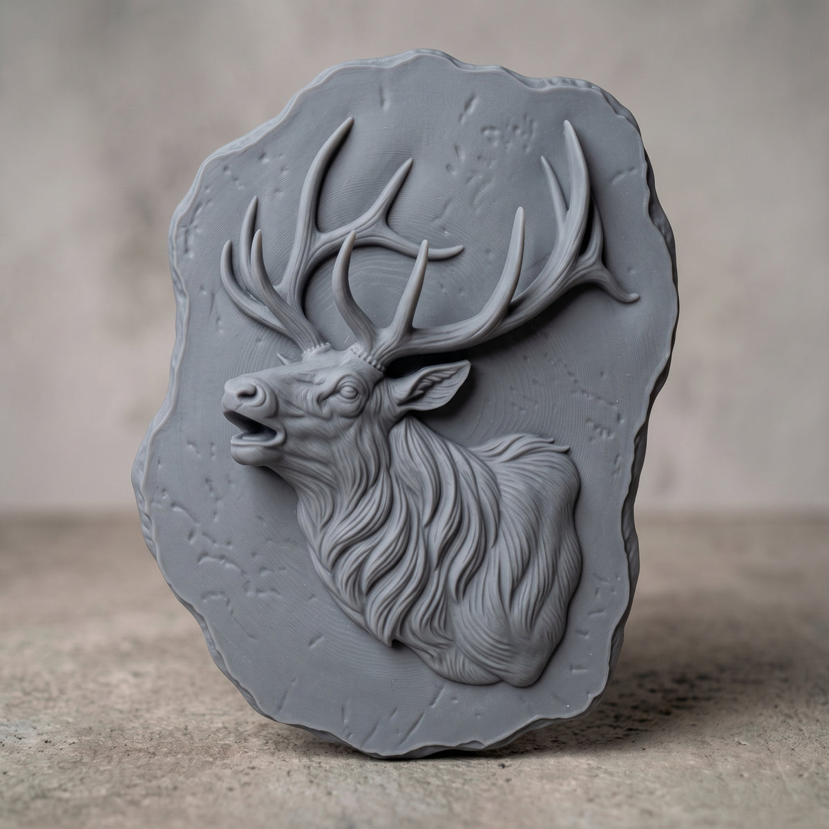 Detailed 3D bas-relief of a bugling bull elk in side profile with open mouth, large branching antlers, shaggy mane and fine fur texture. Set on a rough-edged stone plaque with weathered surface texture, shown in carved walnut wood. Designed for CNC relief carving, woodworking and 3D printing as rustic wildlife wall decor.