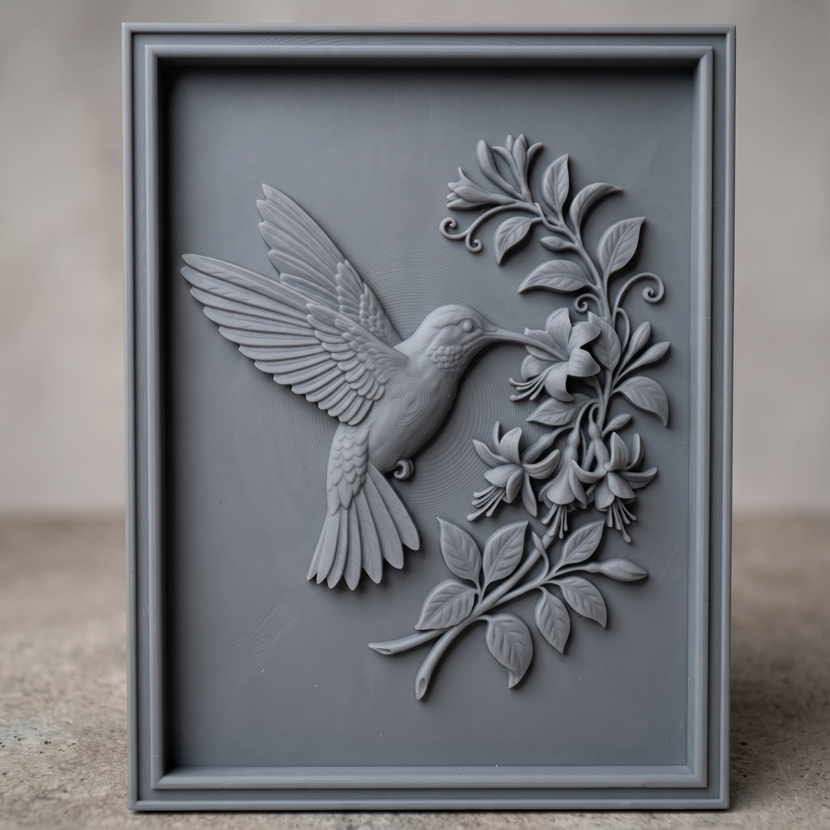 Detailed 3D bas-relief of a hummingbird in flight, wings fully spread, feeding at a cluster of trumpet-shaped fuchsia flowers with curling vines and leaves. Carved in rich walnut wood grain with fine feather texture, set within a raised rectangular frame border. Designed for CNC relief carving, wood routing, resin casting, and 3D printing as wall decor.