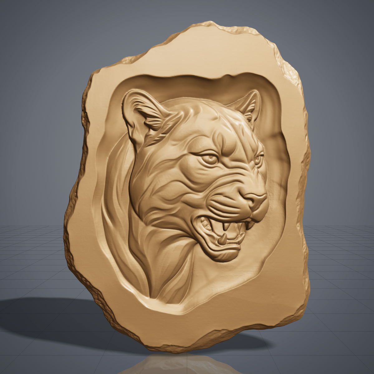 Carved walnut wood mountain lion head cutout with an irregular live edge outline, shown as a CNC relief model on a workshop bench and as a grey resin render. Digital STL file for CNC routers and 3D printers, ideal for wall art, wildlife decor and woodworking projects.