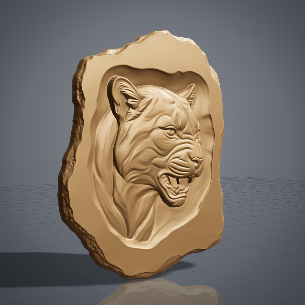 Carved walnut wood mountain lion head cutout with an irregular live edge outline, shown as a CNC relief model on a workshop bench and as a grey resin render. Digital STL file for CNC routers and 3D printers, ideal for wall art, wildlife decor and woodworking projects.