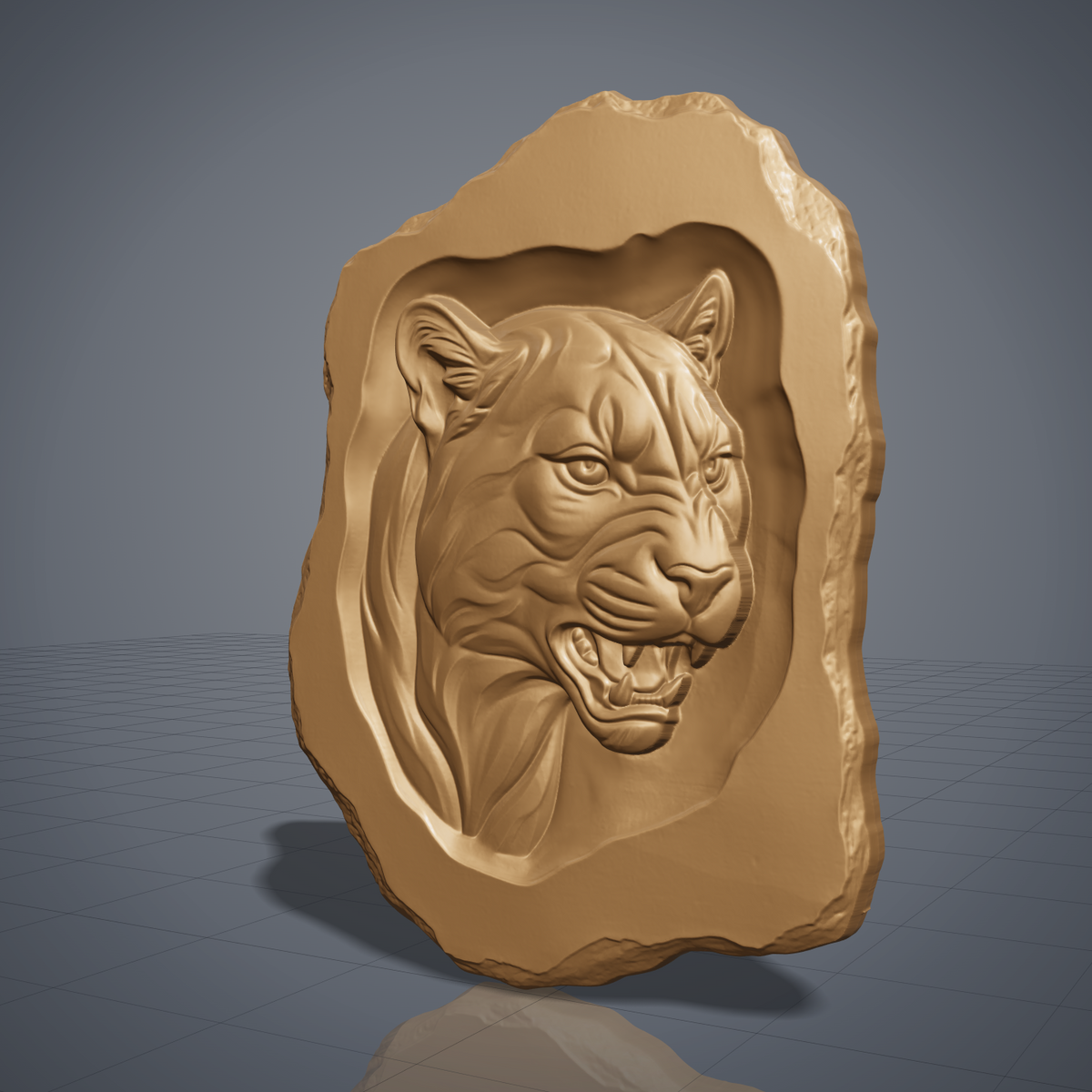 Carved walnut wood mountain lion head cutout with an irregular live edge outline, shown as a CNC relief model on a workshop bench and as a grey resin render. Digital STL file for CNC routers and 3D printers, ideal for wall art, wildlife decor and woodworking projects.
